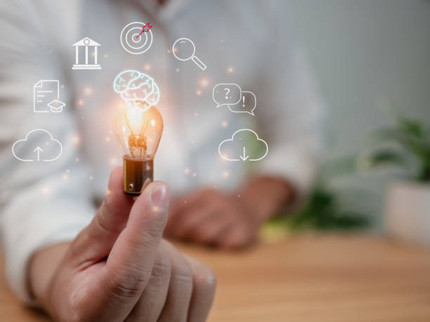 istock human is holding a light bulb. It represents the concept of education, learning, innovation, and success. 1503105211