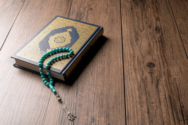 istock The Holy Al Quran with written Arabic calligraphy 1503136288
