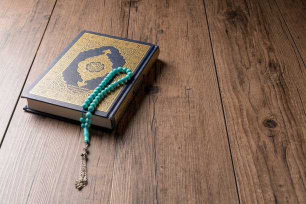 istock The Holy Al Quran with written Arabic calligraphy 1503136291