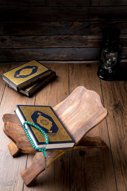 istock The Holy Al Quran with written Arabic calligraphy 1503136310