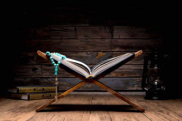 istock The Holy Al Quran with written Arabic calligraphy 1503136316