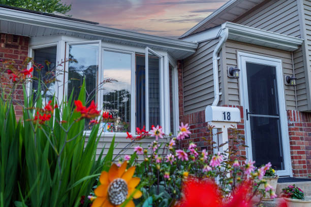 Middle income home on street with natural light showing front of house