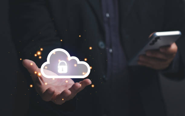 istock online safety concept. Businessman setting up mobile security to conduct various online transactions via mobile phone. Security encryption to prevent data theft from hackers. Cloud. Big Data. 1503152504