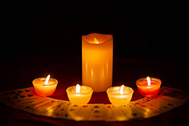 istock Candle lighting and divination with cards horoscope concept images 1503161720