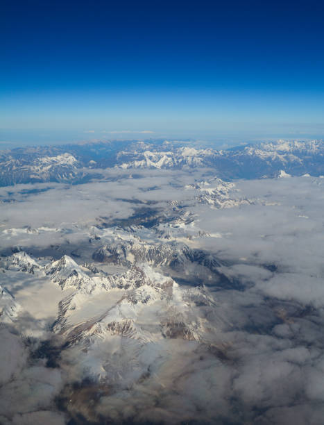 istock Aerial view above snow mountain peaks 1503168268