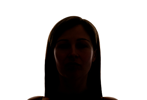 Dark silhouette of a young woman on a white background, front view, the concept of anonymity