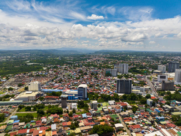 Aerial view survey of Davao City. Philippines. Air survey of colorful buildings and modern financial and business district of Davao City. Mindanao, Philippines. davao city stock pictures, royalty-free photos & images