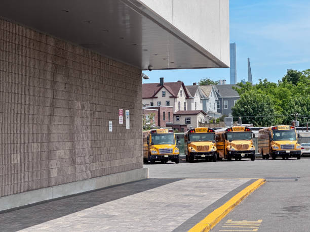 istock School building and school buses 1503181317