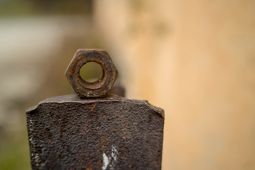 close up view of rusty bolt and nut . corrosion of steel .