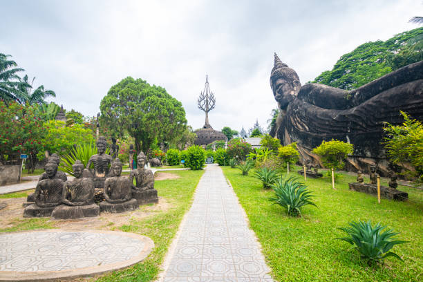 views of famous buddha park in vientiane, laos vientiane, laos. 31th may 2023: views of many sculpture of buddha park. it contains over 200 Hindu and Buddhist statues vientian stock pictures, royalty-free photos & images
