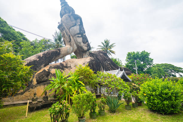 views of famous buddha park in vientiane, laos vientiane, laos. 31th may 2023: views of many sculpture of buddha park. it contains over 200 Hindu and Buddhist statues vientian stock pictures, royalty-free photos & images