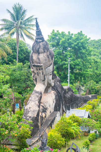 views of famous buddha park in vientiane, laos vientiane, laos. 31th may 2023: views of many sculpture of buddha park. it contains over 200 Hindu and Buddhist statues vientian stock pictures, royalty-free photos & images