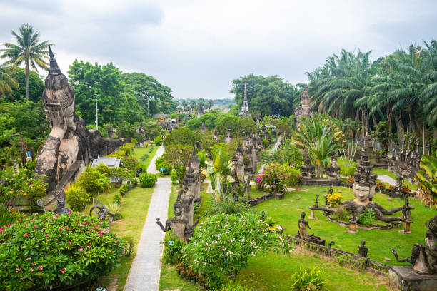 views of famous buddha park in vientiane, laos vientiane, laos. 31th may 2023: views of many sculpture of buddha park. it contains over 200 Hindu and Buddhist statues vientian stock pictures, royalty-free photos & images