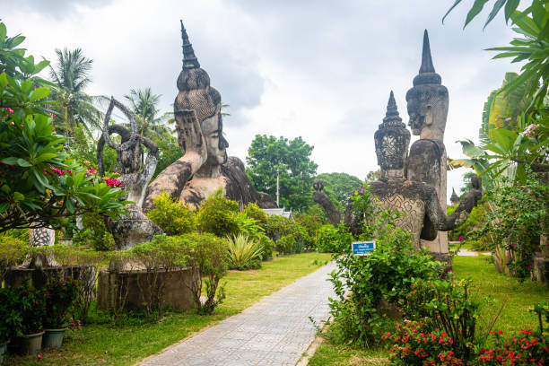 views of famous buddha park in vientiane, laos vientiane, laos. 31th may 2023: views of many sculpture of buddha park. it contains over 200 Hindu and Buddhist statues vientian stock pictures, royalty-free photos & images