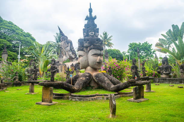 views of famous buddha park in vientiane, laos vientiane, laos. 31th may 2023: views of many sculpture of buddha park. it contains over 200 Hindu and Buddhist statues vientian stock pictures, royalty-free photos & images
