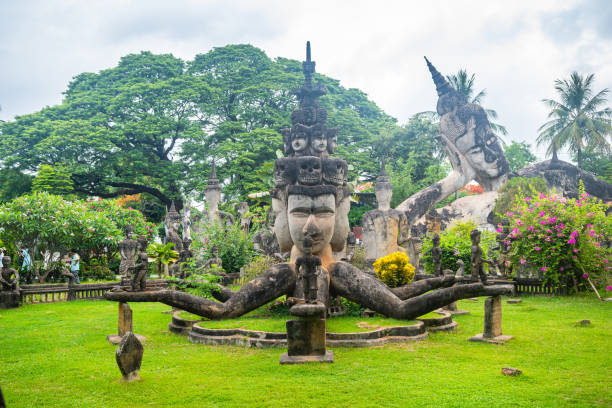 views of famous buddha park in vientiane, laos vientiane, laos. 31th may 2023: views of many sculpture of buddha park. it contains over 200 Hindu and Buddhist statues vientian stock pictures, royalty-free photos & images