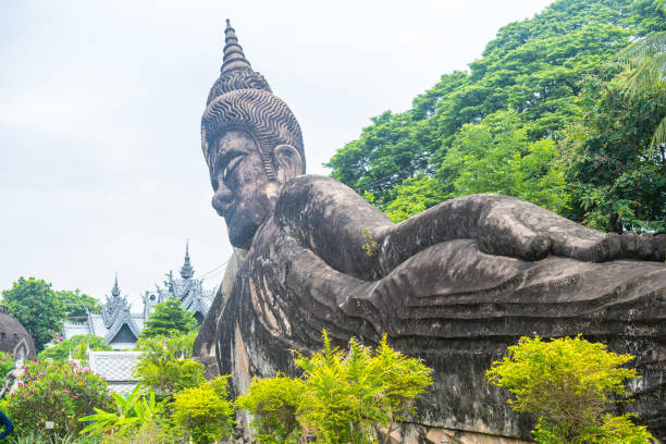 views of famous buddha park in vientiane, laos vientiane, laos. 31th may 2023: views of many sculpture of buddha park. it contains over 200 Hindu and Buddhist statues vientian stock pictures, royalty-free photos & images
