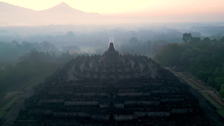 Borobudur temple on the background of sunrise and fog. Aerial view. Java, Indonesia