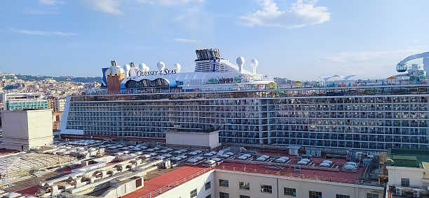 Naples, Italy - May 27, 2023: The new cruise ship Odyssey of the Seas by Royal Caribbean docked at cruise port Naples, Italy on May 27, 2023