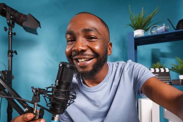 istock Smiling influencer recording vlog video 1503221735