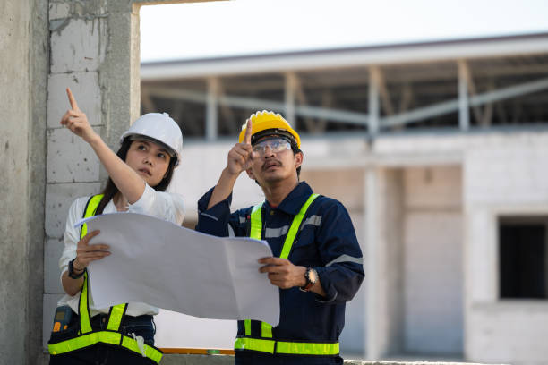 istock Progressive Construction Project Management with Engineers and Tablets - Blueprint Planning and On-Site Expertise 1503223769