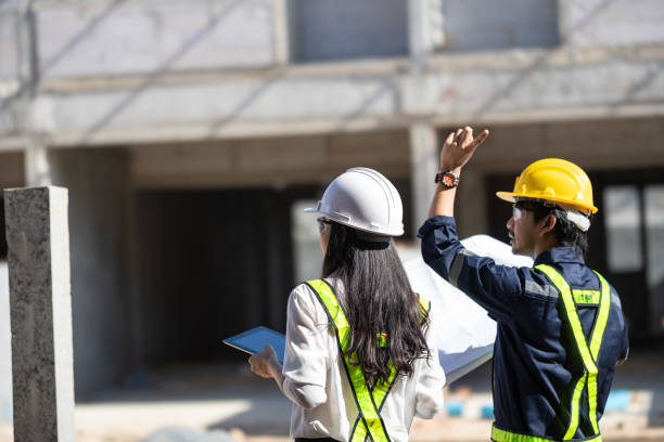 istock Progressive Construction Project Management with Engineers and Tablets - Blueprint Planning and On-Site Expertise 1503224312