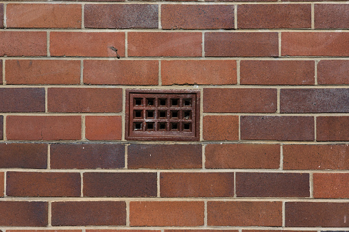 Brick wall isolated against white