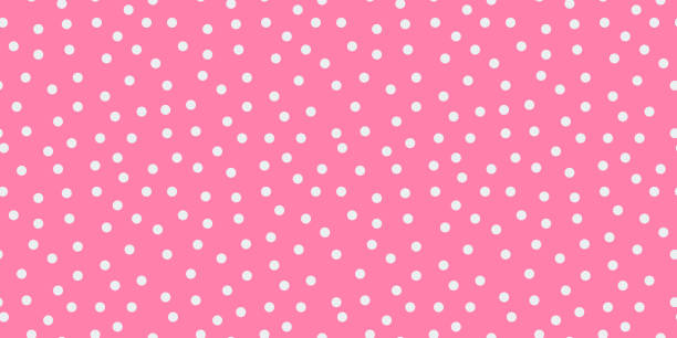 Small polka dot seamless pattern background. random dots texture. pink and white dots textile Small polka dot seamless pattern background. random dots texture. pink and white dots polka dot stock illustrations