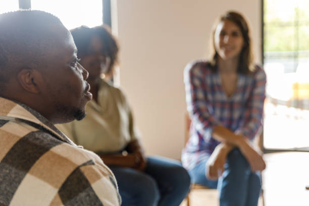 istock Sharing struggles of daily life and mental health problems during a group therapy session 1503234442