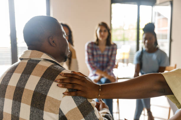 istock Young man talking about his mental health struggles during a group therapy session 1503234454