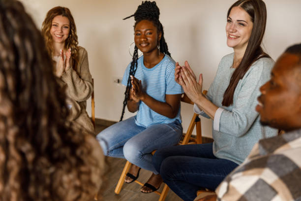 istock Group of people applauding after a successful group therapy session 1503234947