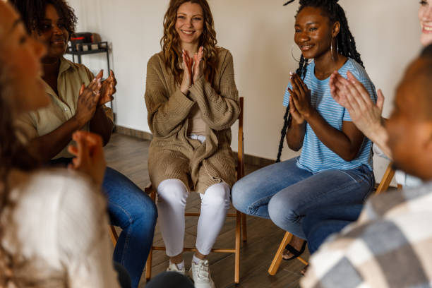 istock Group of people applauding after a successful group therapy session 1503234949