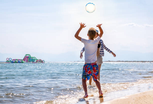 istock with a ball on the sea 1503239987