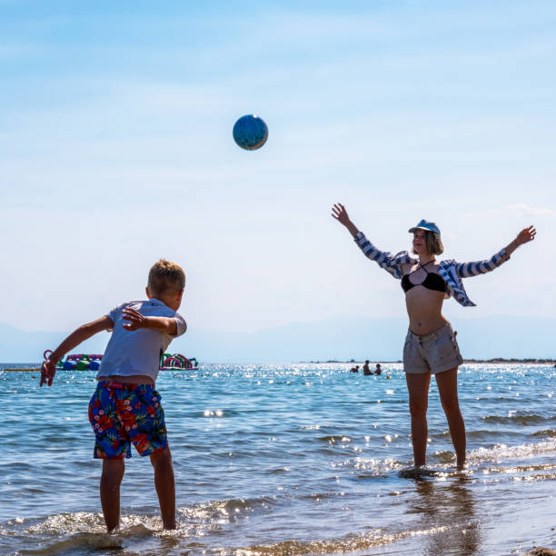 istock with a ball on the sea 1503240045