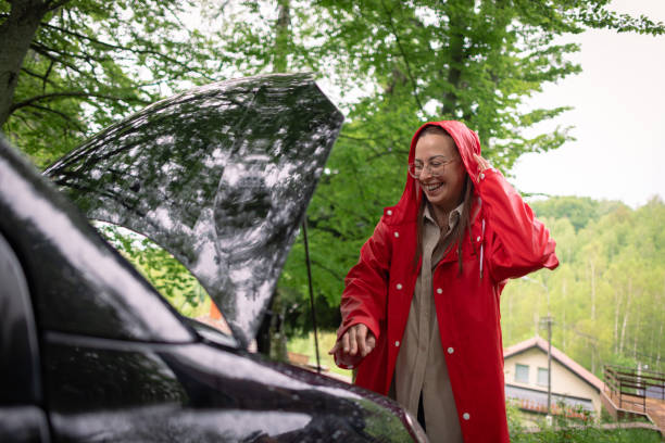 istock Woman in Red Raincoat Strives to Restore Mobility 1503241778