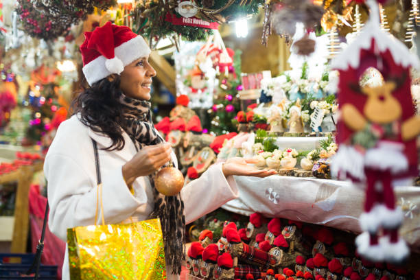 istock Latin woman at christmas fair 1503241820