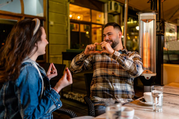 istock Deaf couple enjoying a night out in a charming cafe 1503248425
