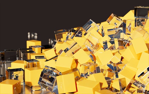 yellow and transparent blocks on reflective surface close-up 3D computer generated background