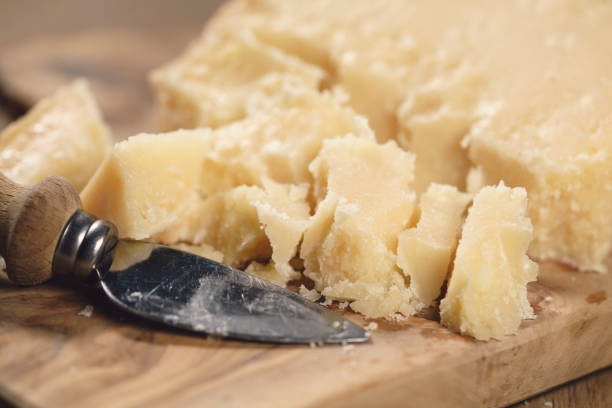 istock traditional grana padano italian cheese on olive board 1503253131