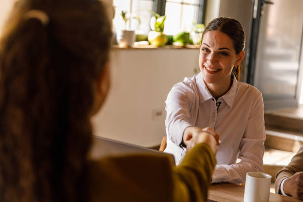 istock Businesswomen shaking hands when meeting for a job interview 1503253263