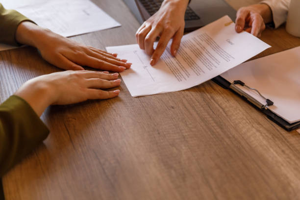 istock Interviewer giving a contract to candidate to sign 1503253320