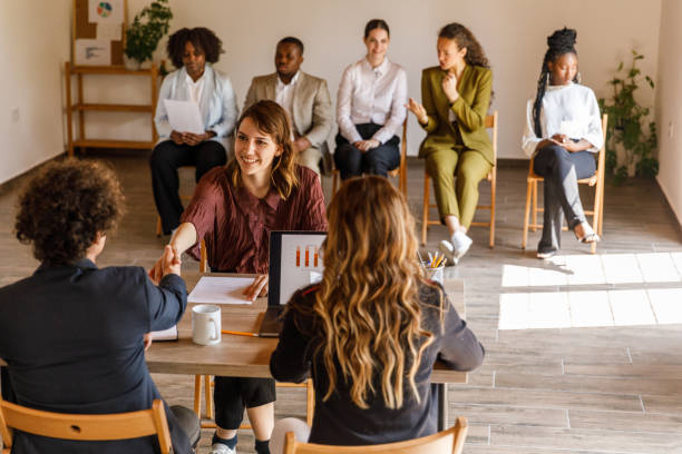 istock Interviewer and candidate shaking hands at the beginning of a job interview meeting 1503253363