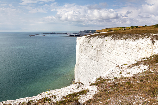 A view of the white cliffs that form part of the Seven Sisters coastline in East Sussex, UK.