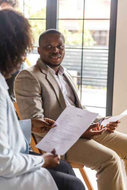 istock Business casually chatting while waiting for a job interview meeting 1503255906