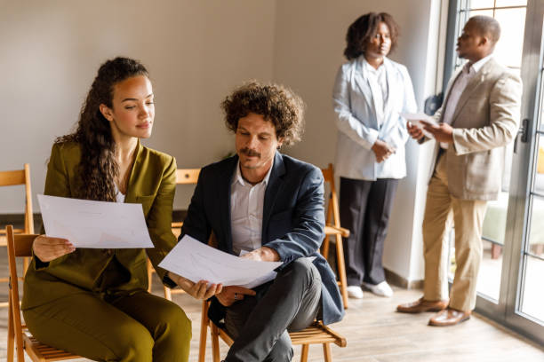 istock Business casually chatting while waiting for a job interview meeting 1503255920