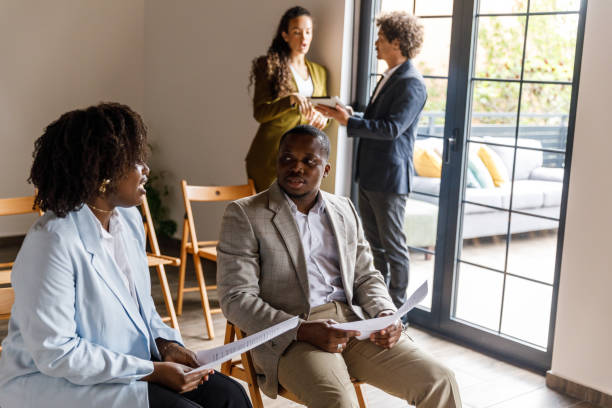 istock Business casually chatting while waiting for a job interview meeting 1503255929