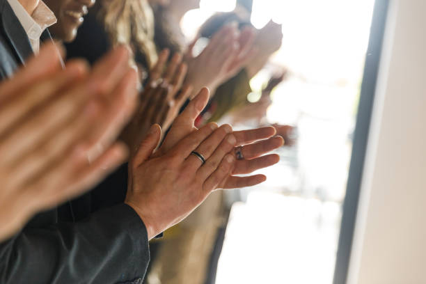 istock People standing in line, applauding together 1503256680