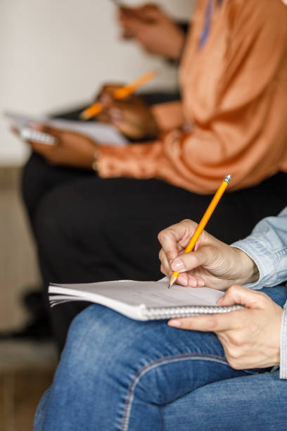 istock Business people taking notes during a presentation or a seminar 1503258956