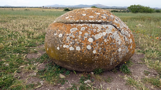 Sassari, Sardinia in Italy, May 18 2023. One of the sacred stones of the altar of Monte D'Accoddi. Dating back to 4000 BC.