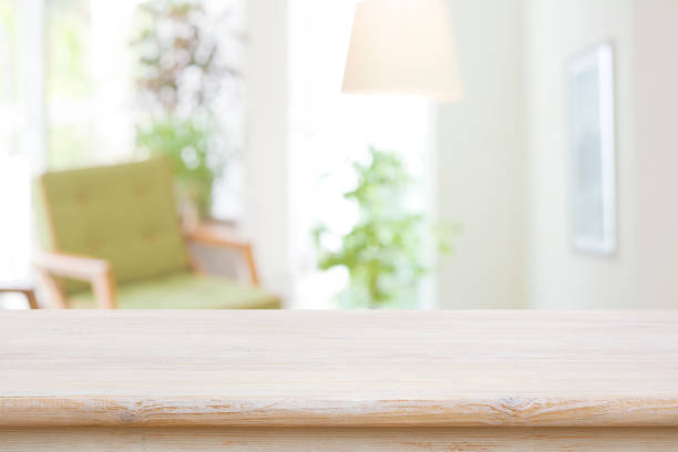 istock Empty table or shelf with blurred view of living room 1503259693